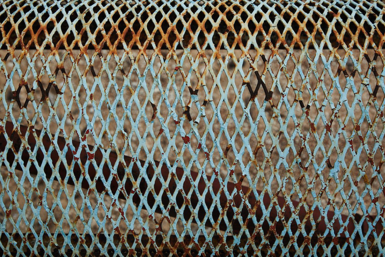 How to Restore a Rusty Iron Fence