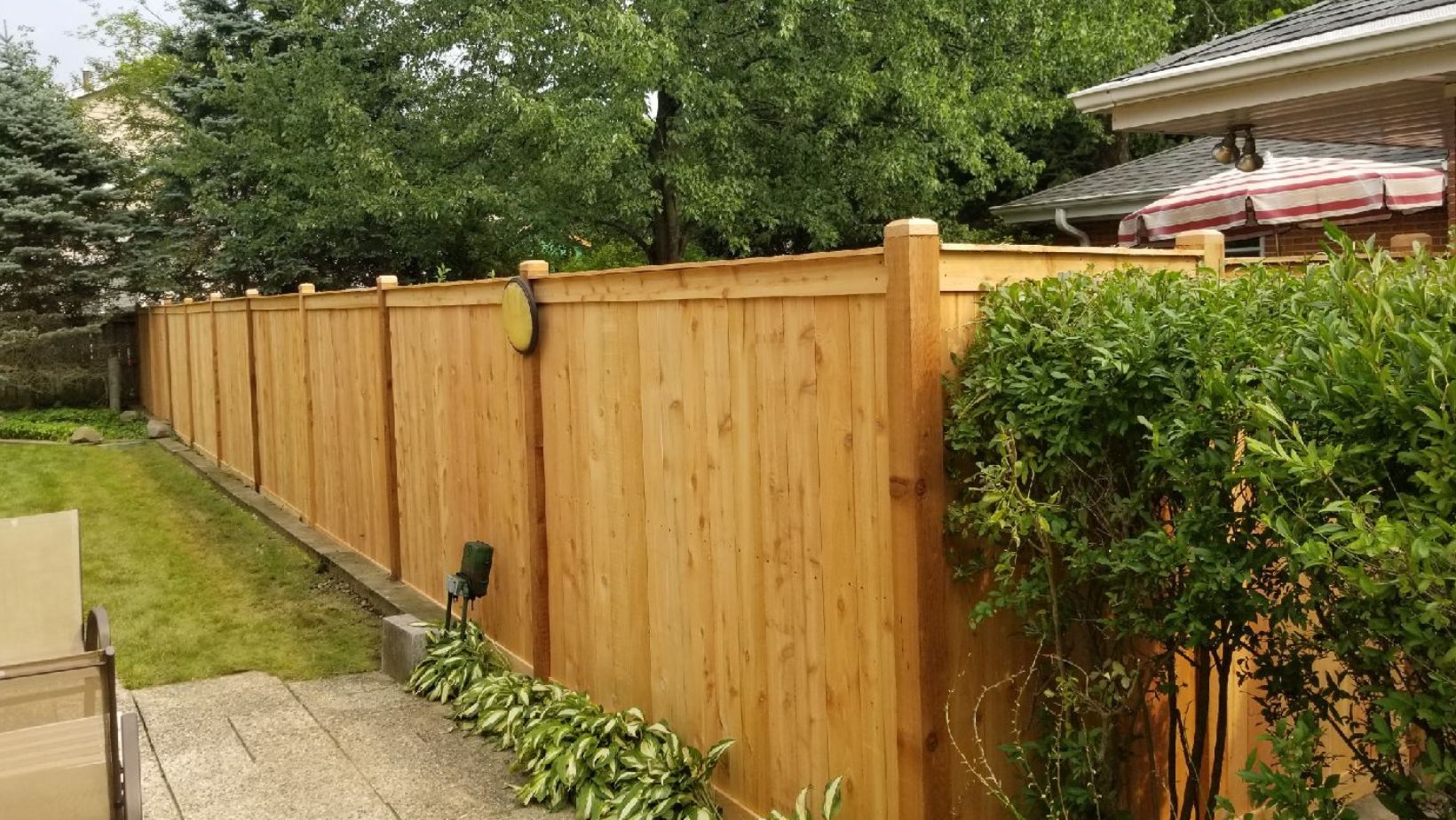 Are There Any Regulations Or Permits Required To Install A Wooden Fence In Residential Areas?