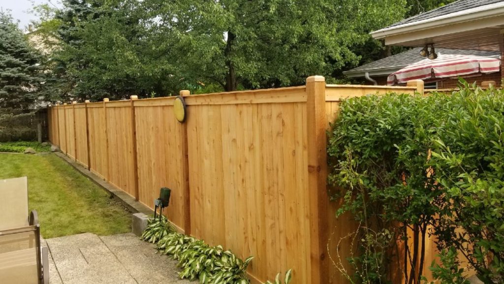 advantages of installing an industrial wood fence on your property