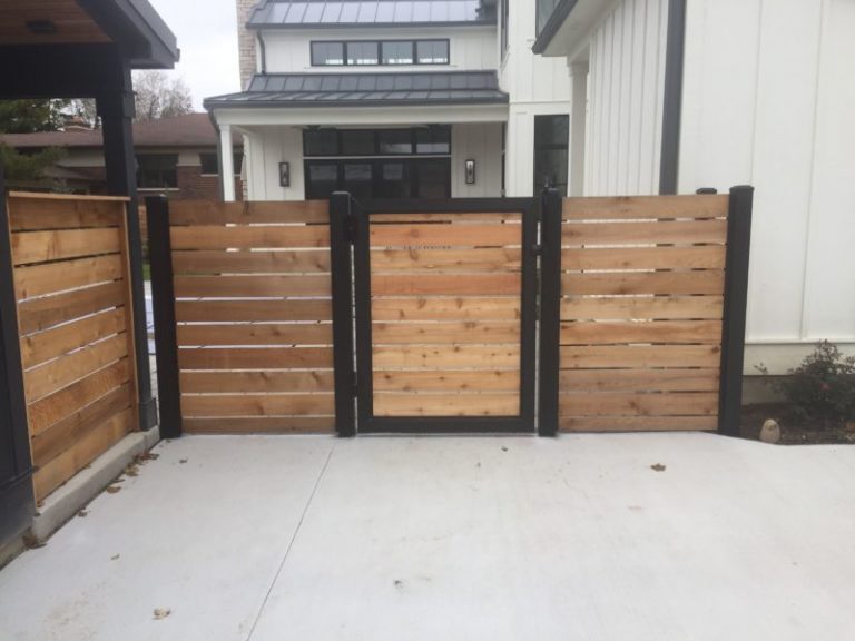 wood and vinyl picket fencing