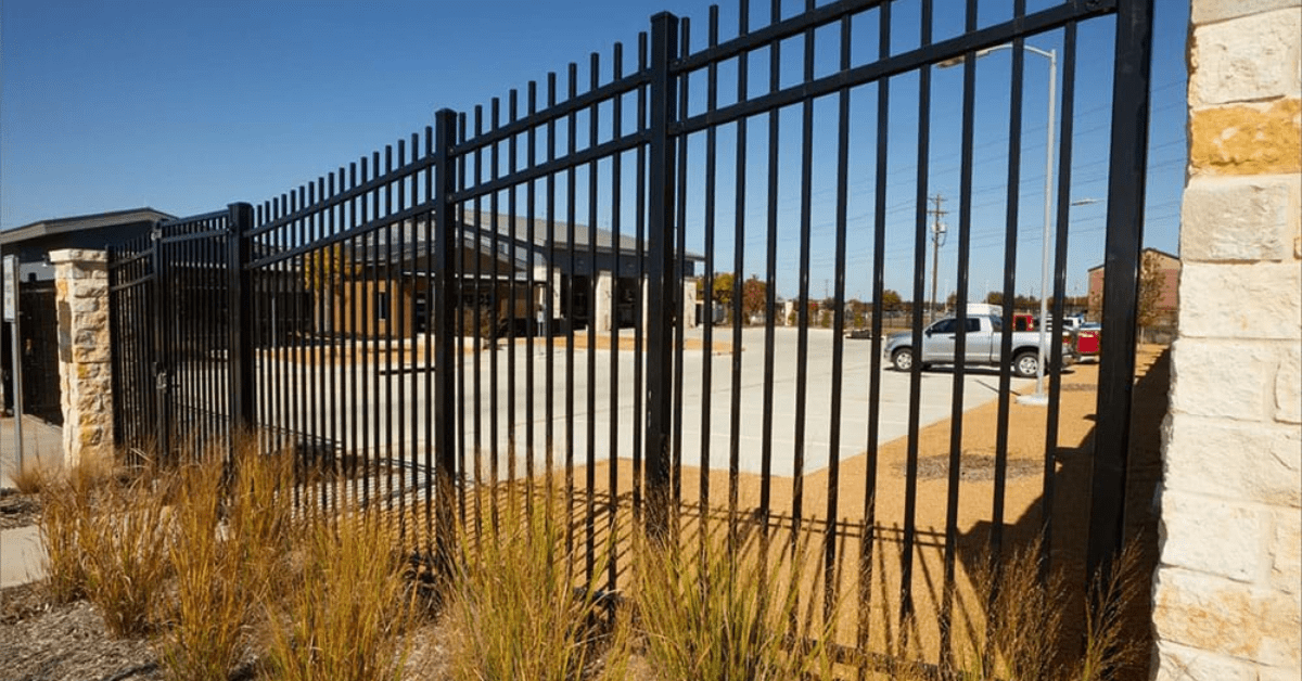 seamlessly integrate iron fencing into industrial landscapes